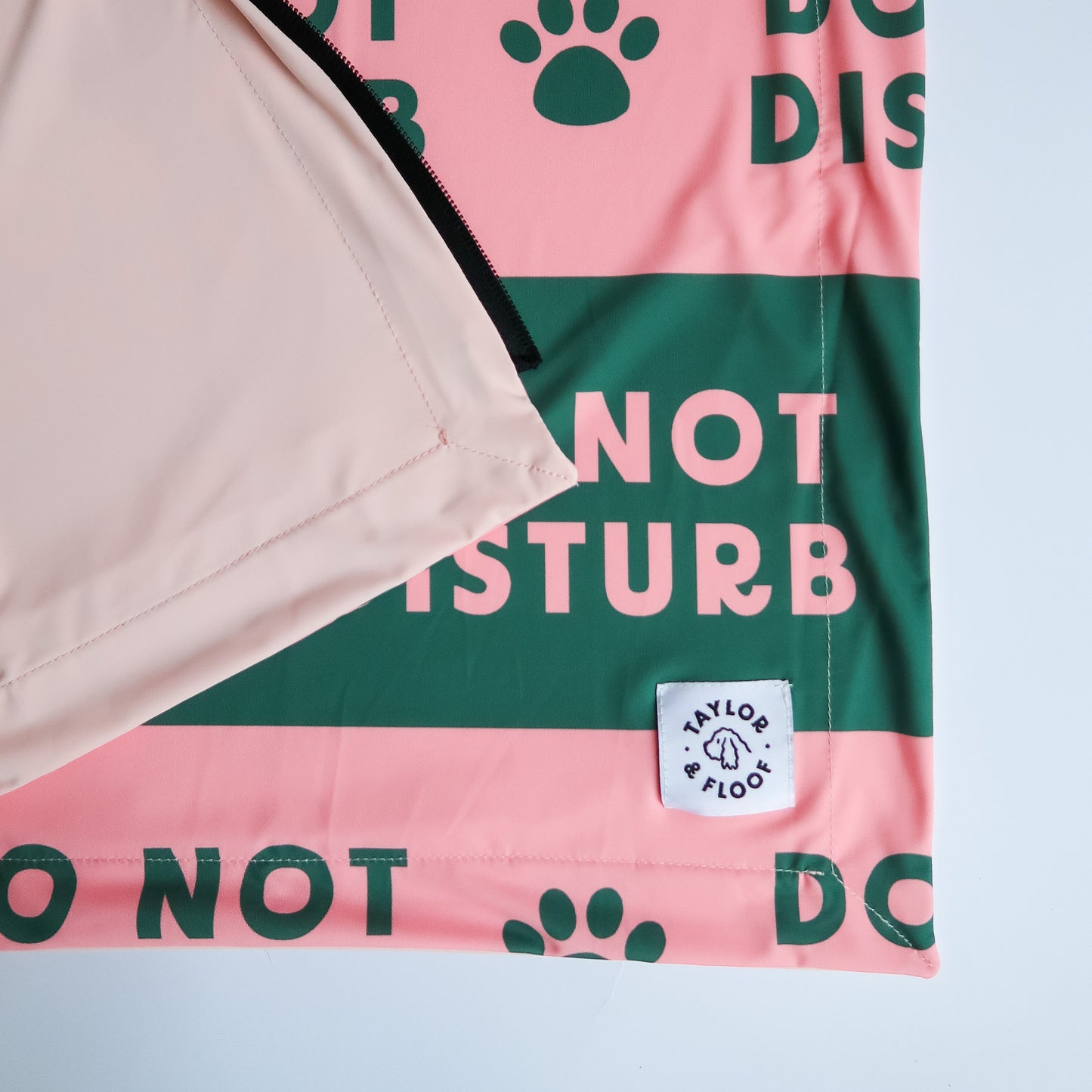 Taylor and Floof Do Not Disturb cooling mat – breathable, portable dog cooling essential. Do not disturb design in pink and green stripes. Perfect for assistance dogs and dogs in training. Zipper down one side of the cooling mat to be able to attach to a Pitta pocket.