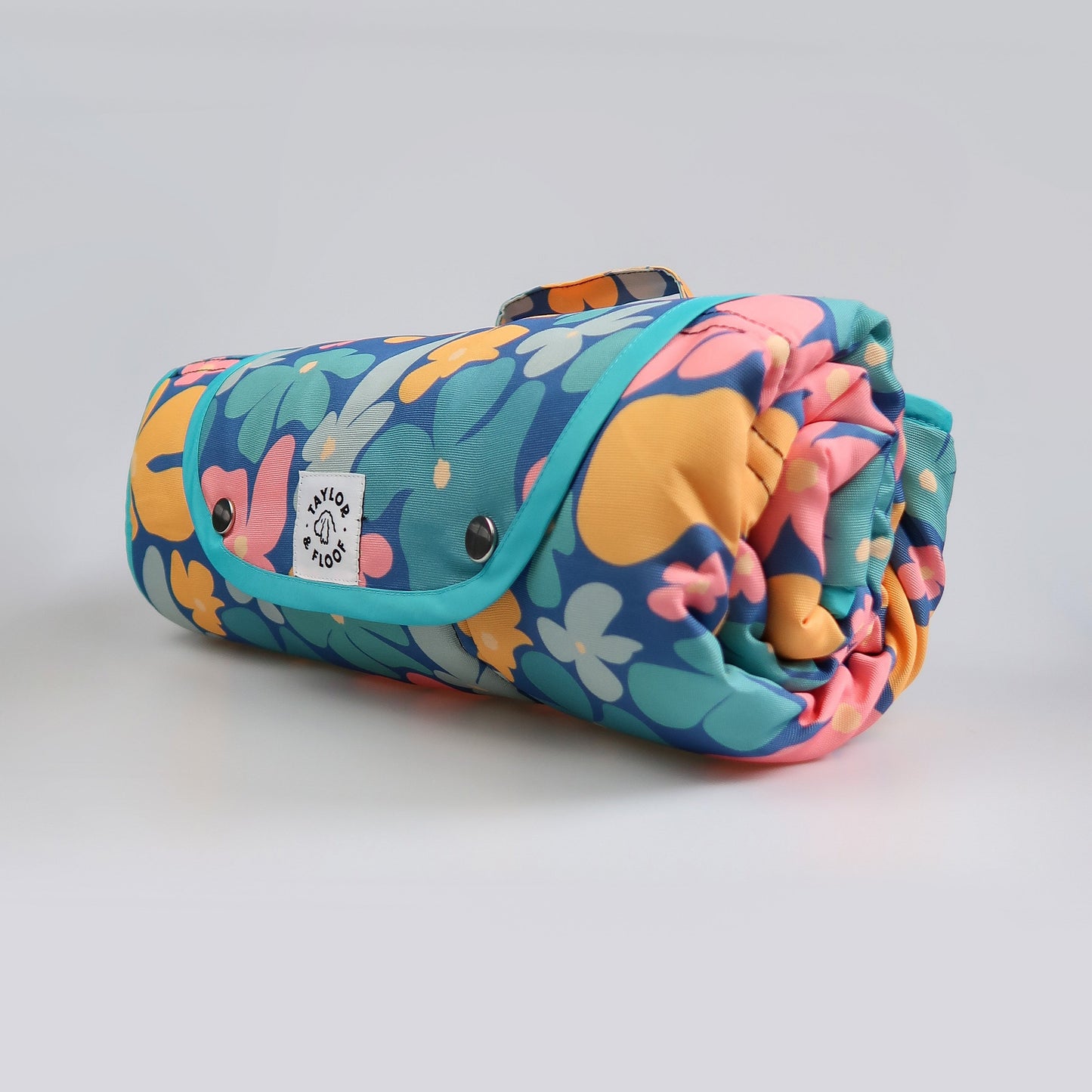 Folded Blooming Wild settle mat for dogs, showing compact storage for convenient settle training on the go.