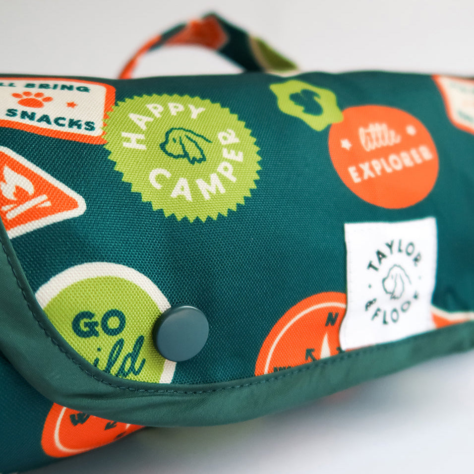 Non-slip base and waterproof coating shown on Taylor and Floof's best-selling dog settle mat.