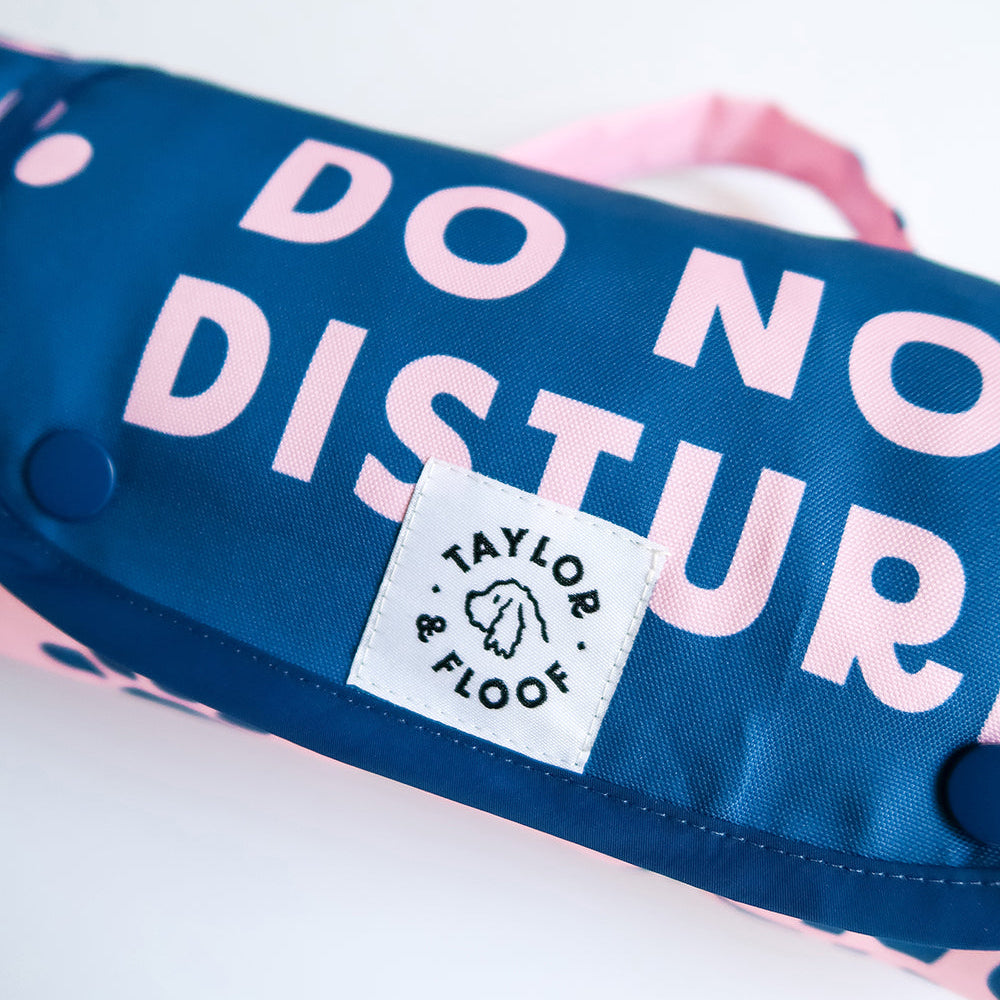 Close-up of non-slip and waterproof backing on the Do Not Disturb 2.0 dog training mat for effective settle practice.