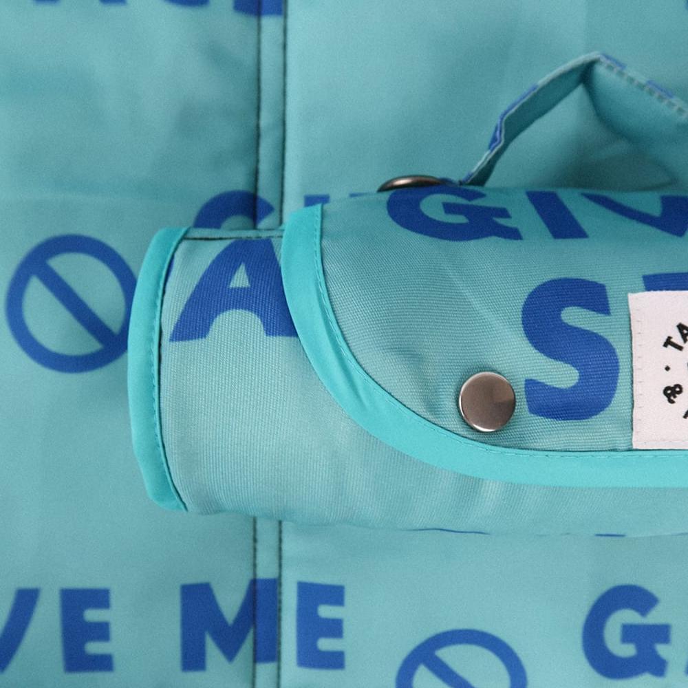 Close-up view of the Give Me Space settle mat, designed for reactive dogs and working dogs to promote calm and comfort. Popper closure settle mat with non slip bottom and easy to clean fabric.