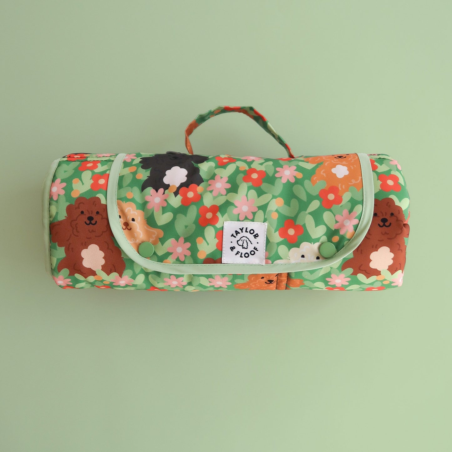 Detailed close-up of doodle dog and cockapoo illustrations on the Floof Flock settle mat. Soft, durable fabric ideal for dog parents who love designer training gear.