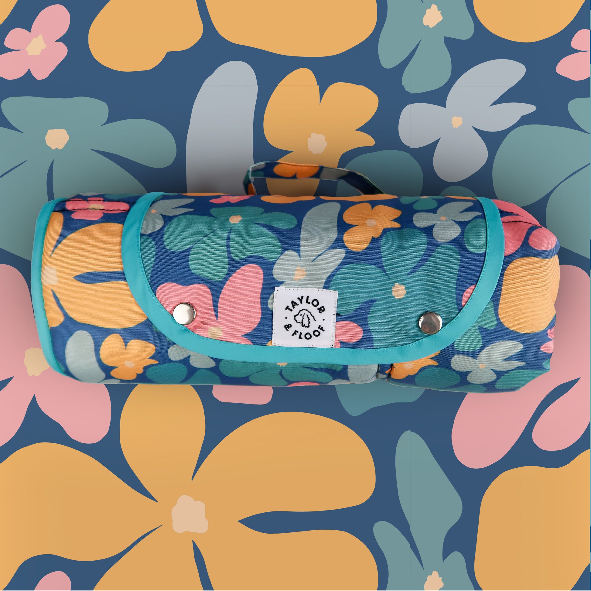 Blooming Wild dog training mat rolled up for easy portability, perfect as a travel mat for dog owners on the go. Blooming Wild Pattern was designed with dog vision in mind. Using colours dogs can see to help aid with their settle training.