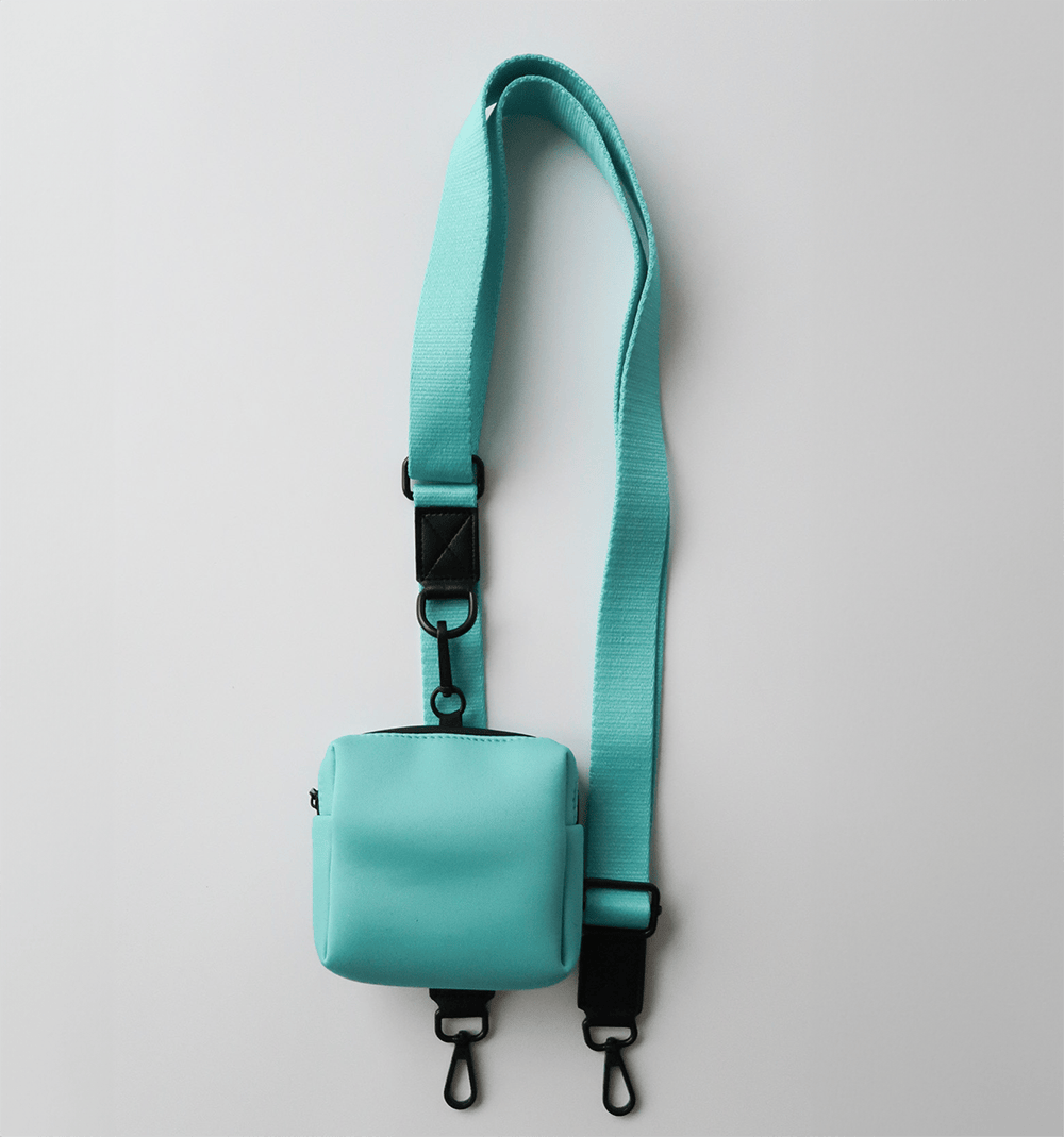 Light blue, shoulder and removable treat pouch. 3cm wide, 96-155cm adjustable length.