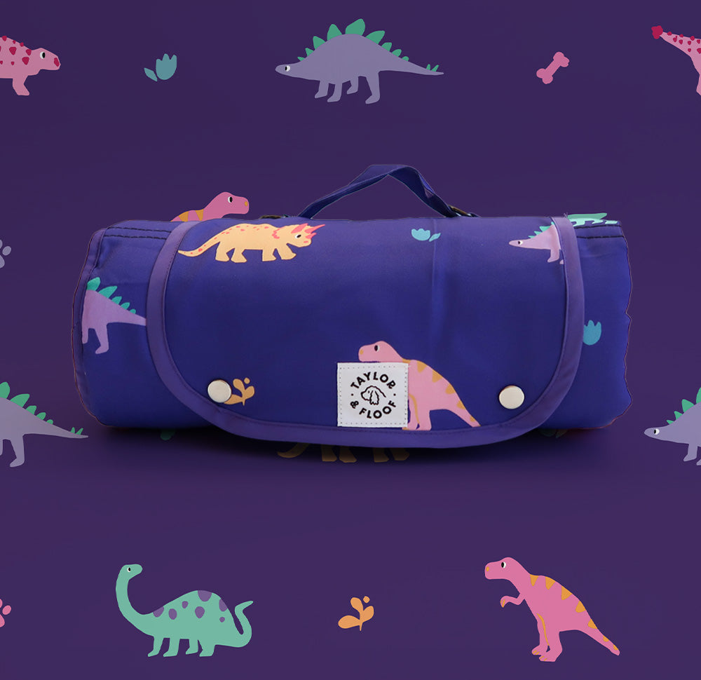 Dino Print Dog Crate and Travel Mat – Lightweight and easy-to-carry purple dinosaur settle mat, perfect for creating a comfy space for dogs at home, in crates, or during adventures.